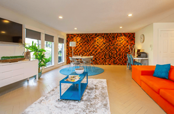 Living room with oversized windows and doors